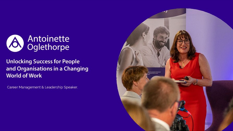 Front cover of the speaker brochure PDF, part of our suite of speaker resources available. The cover features Antoinette Oglethorpe in a red dress gives a presentation to an audience. The screen reads “Antoinette Oglethorpe: Unlocking Success for People and Organisations in a Changing World of Work. Career Management & Leadership Speaker.”.
